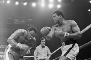 Muhammad Ali Punching Joe Frazier
